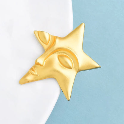Broche Visage