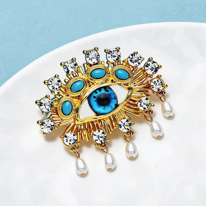 Broche Œil · Perles & Cristal