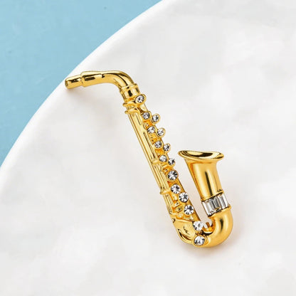 Broche Saxophone · Cristal