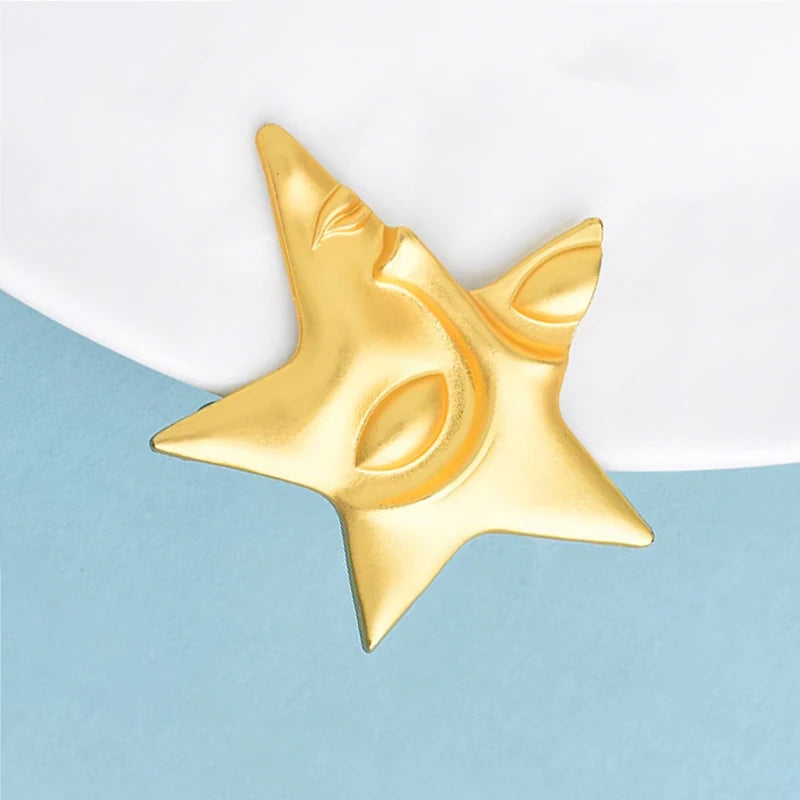 Broche Visage