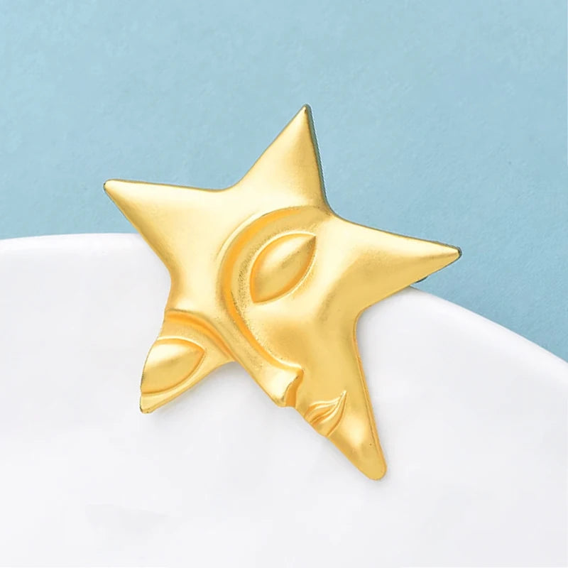 Broche Visage