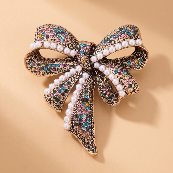 Broche Nœud Vintage · Cristal