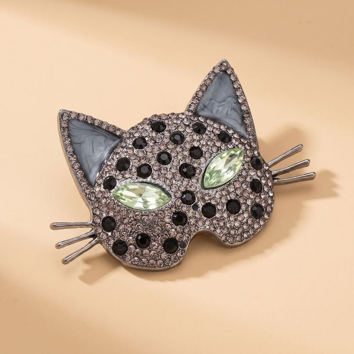 Broche Chat