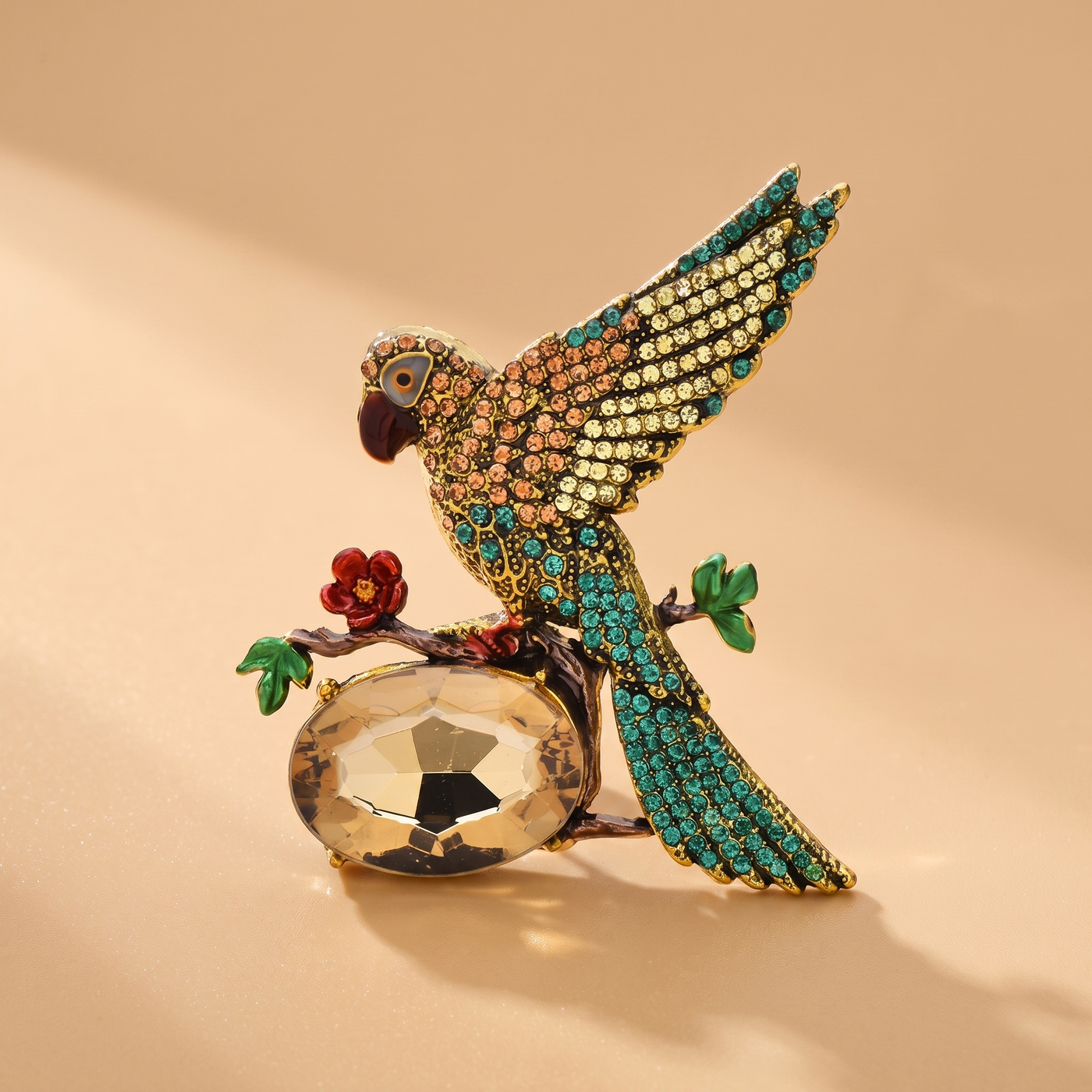 Broche Oiseau en cristal, bijou vintage Alyvoa tenue à la main · Champagne