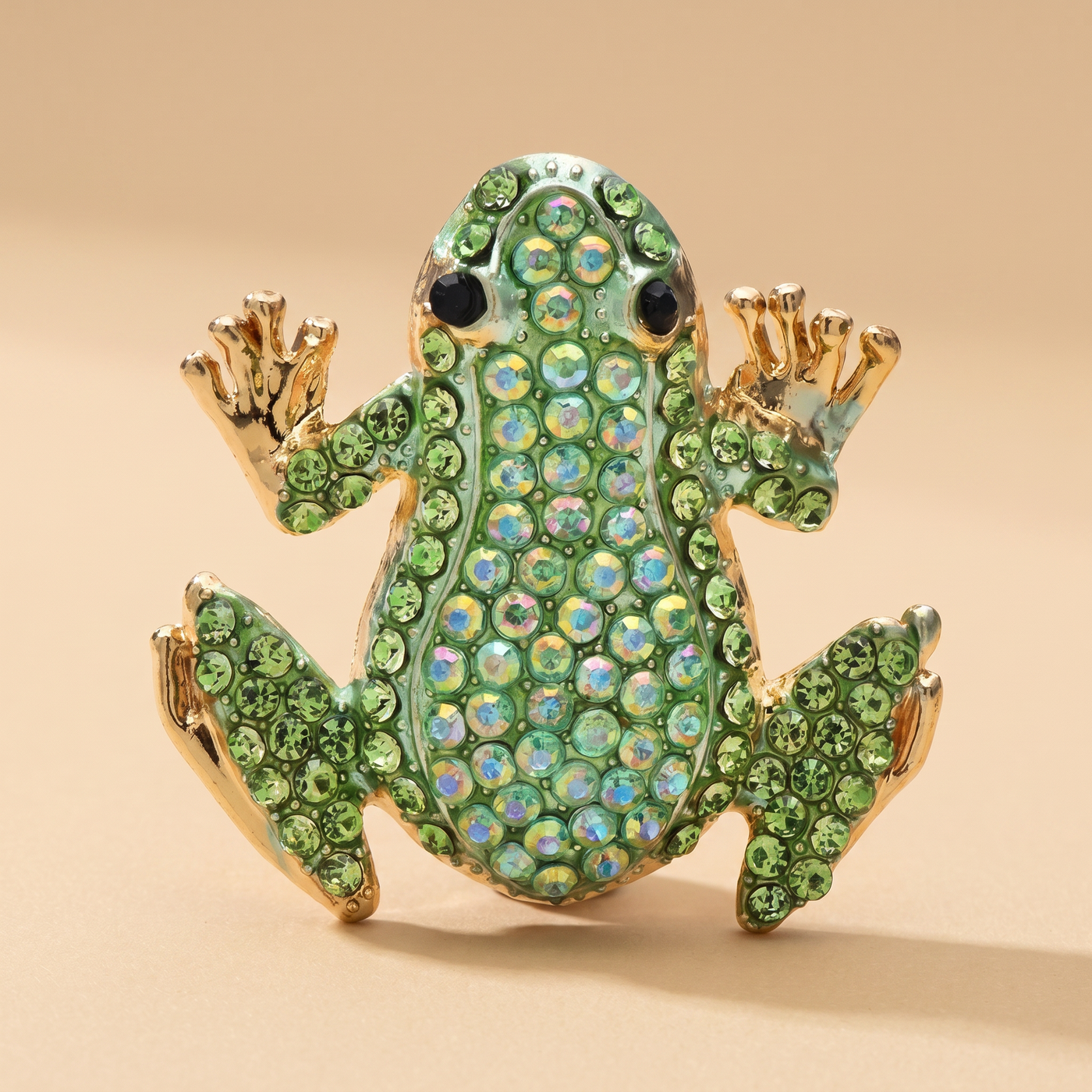 Broche Grenouille en cristal, bijou vintage Alyvoa tenue à la main · Vert